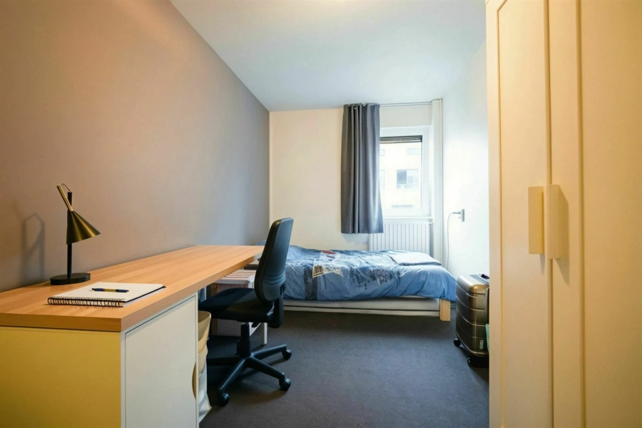 Kot de ± 11 m²  dans un commu de 8 - Quartier Hocaille 